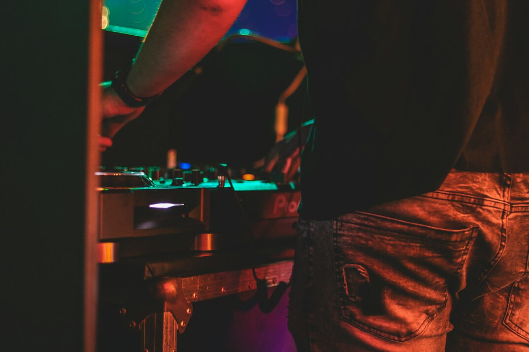 Video operator working at a broadcast vision mixing console